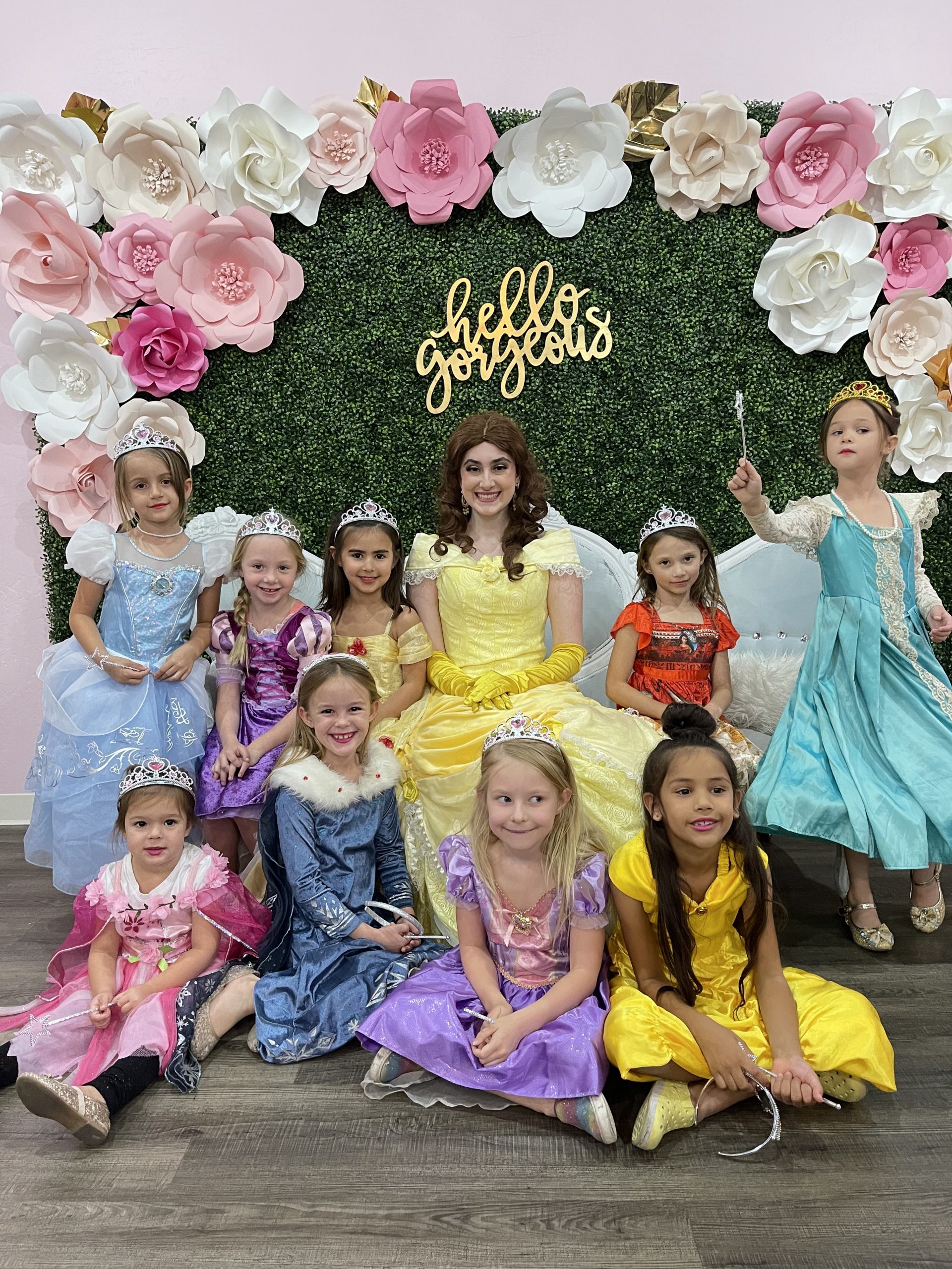 Little girls dressed up as princesses with Belle